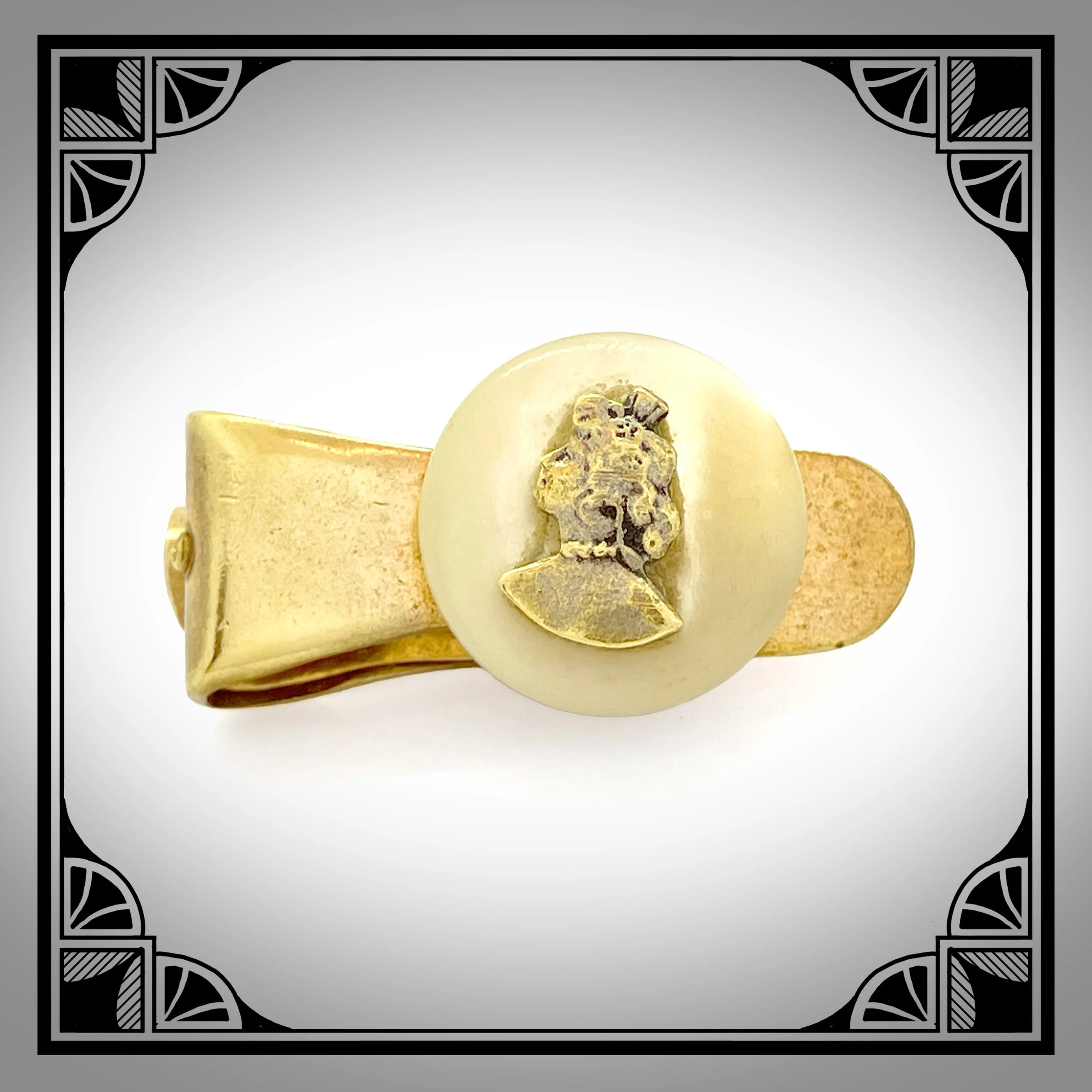 1910s gold plated tie clip with cameo of a lady.jpg