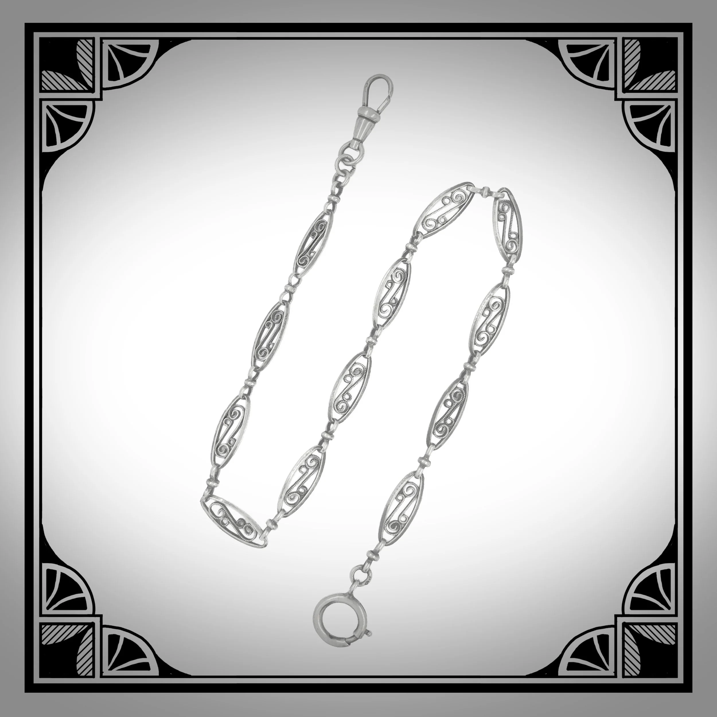 1910s French Silver Waldemar Watch Chain with openwork Filigree Navette-Links 2.jpg