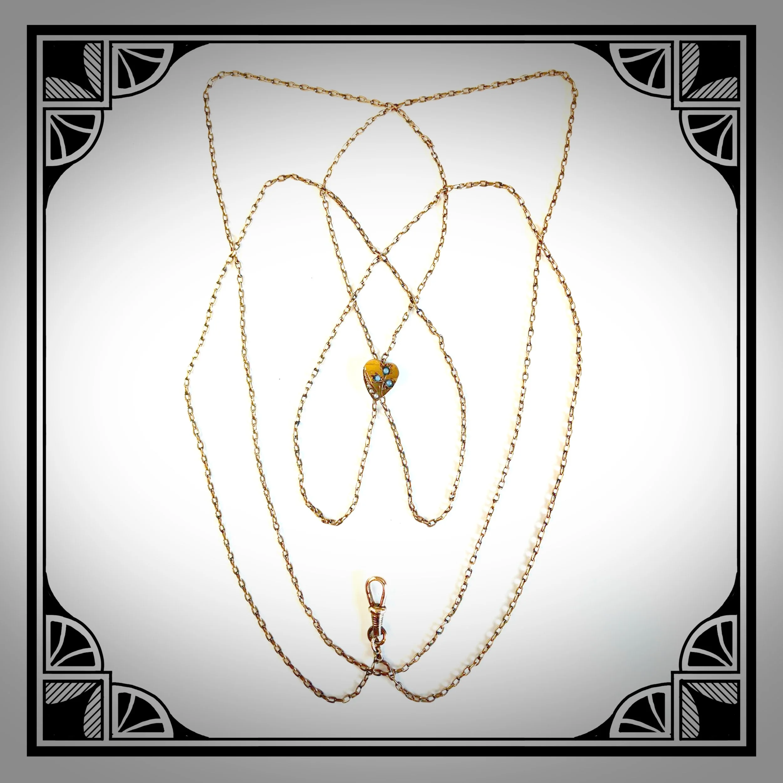 1910s Gold-Plated Sautoir Watch Chain with heart-shaped Slider set with seed pearls and faux opals.jpg