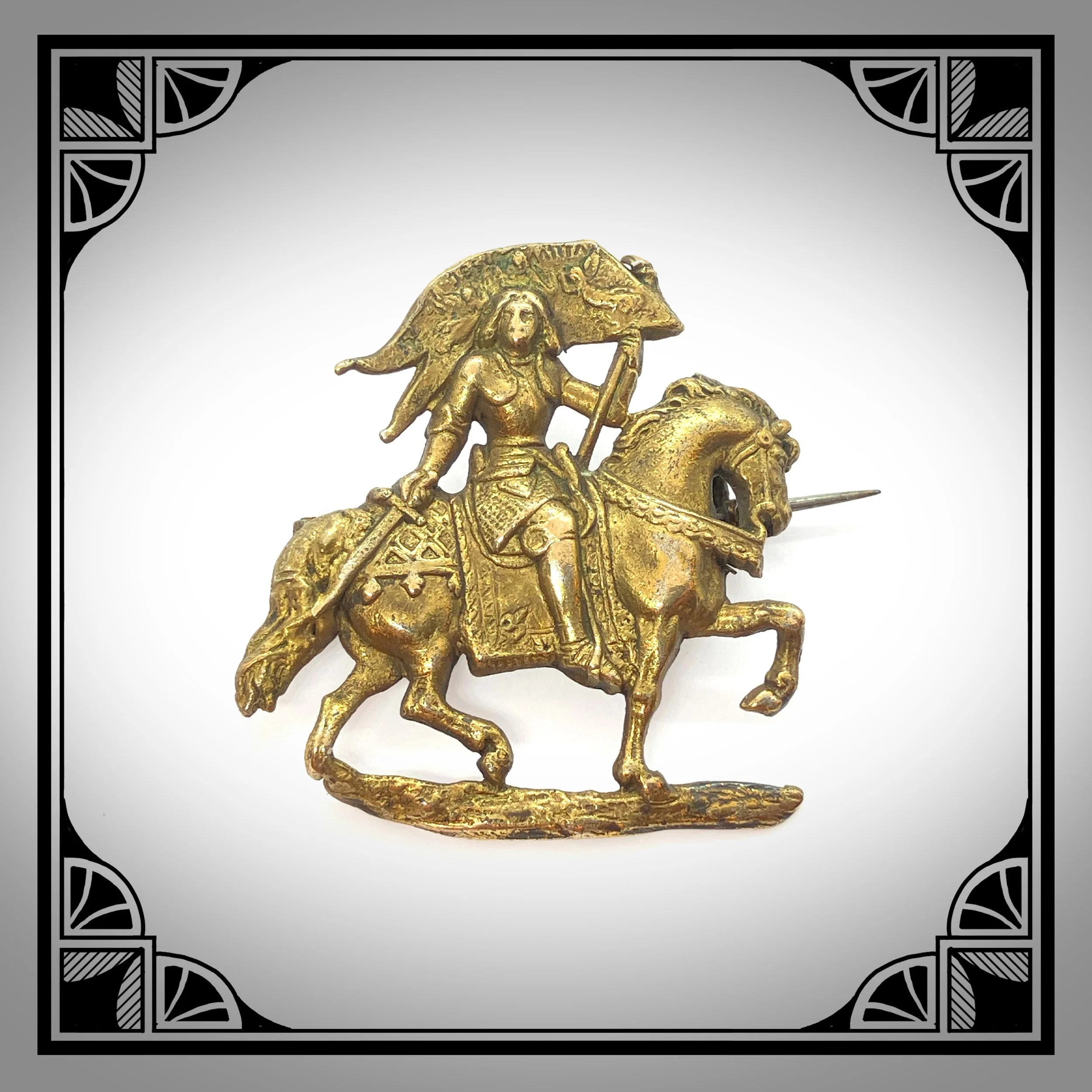 1900s French gold-plated brooch depicting Jeanne D'arc in raised relief