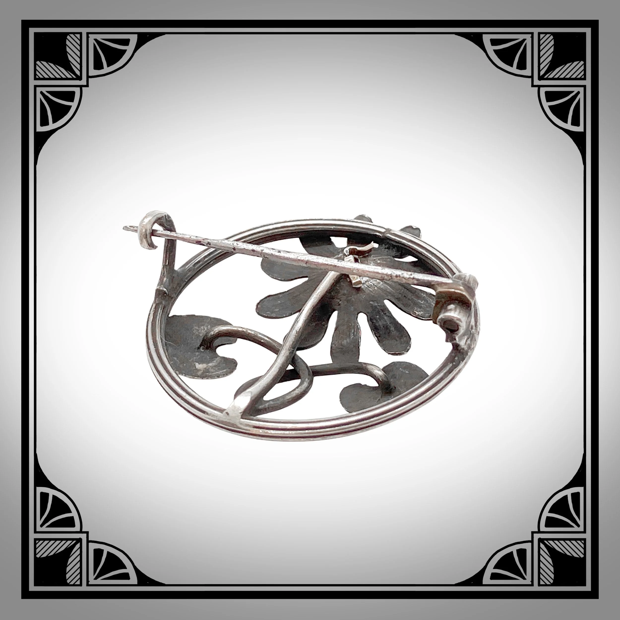 1910s French Handmade Silver Art-Nouveau brooch with stylised flower 3.jpg