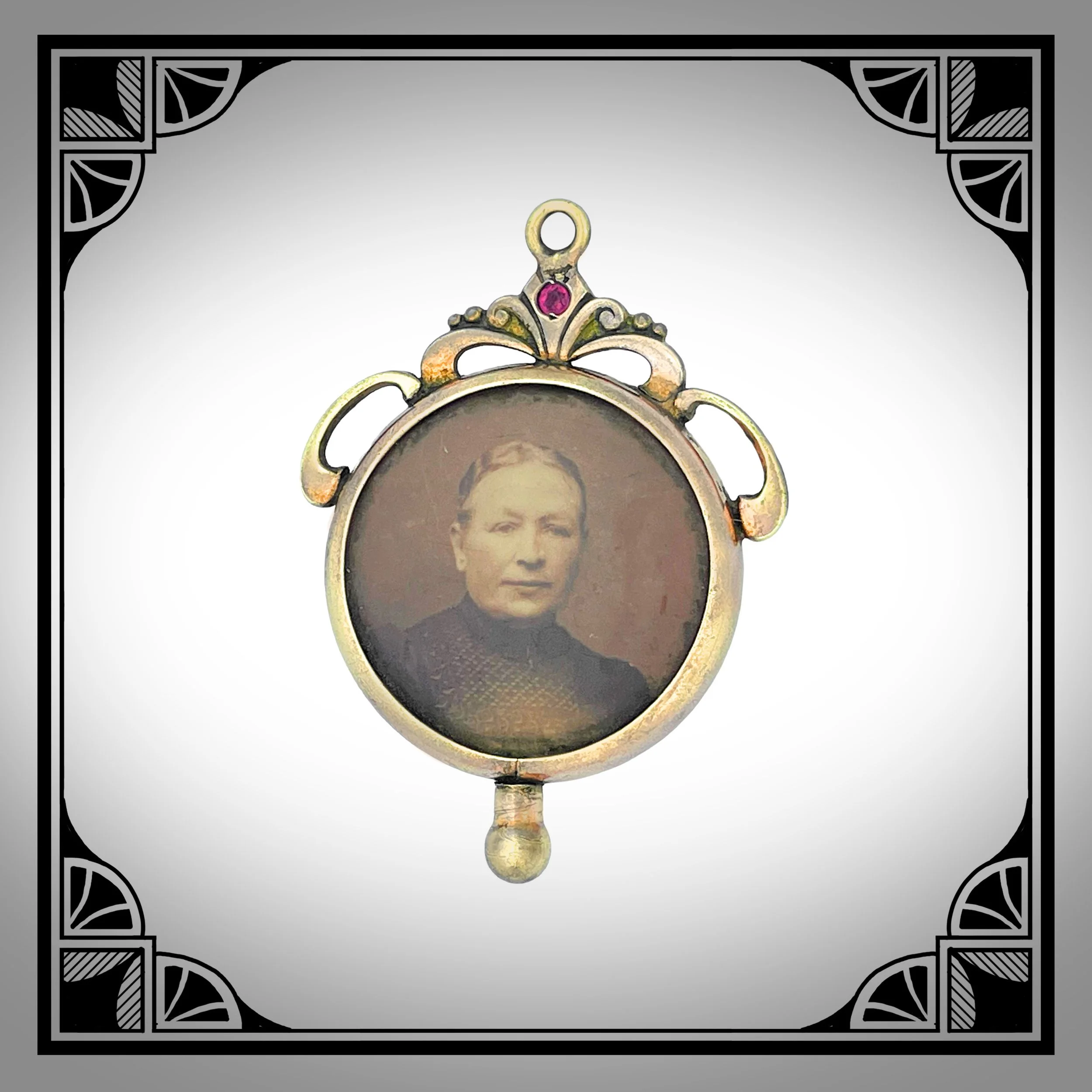 1900s German Gold-Plated Jugendstil Picture Pendant with Red Glass Stone.jpg