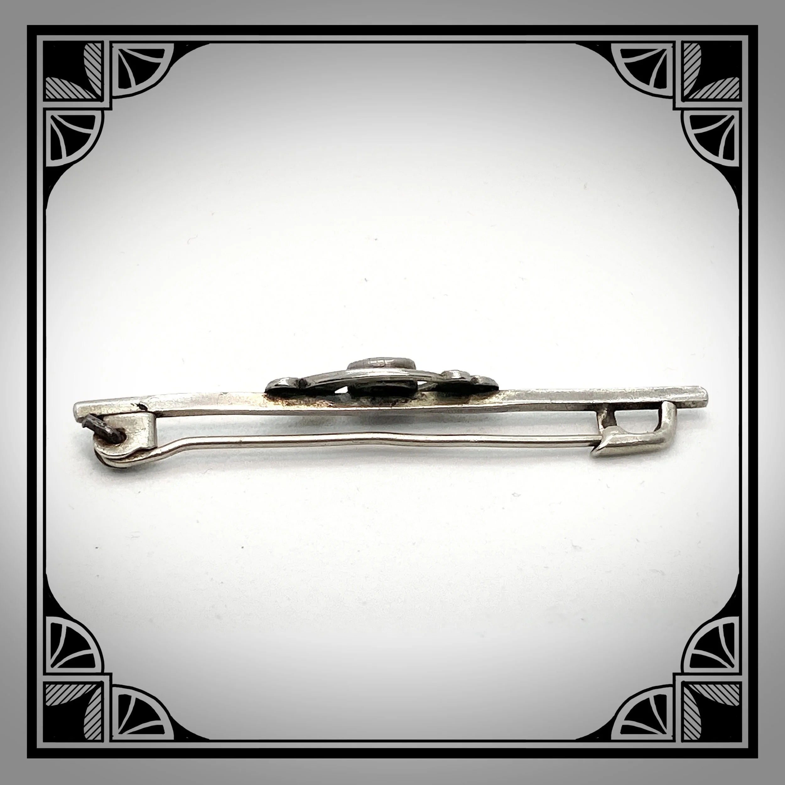 1920s silver colored bar pin with red gemstone 4.jpg