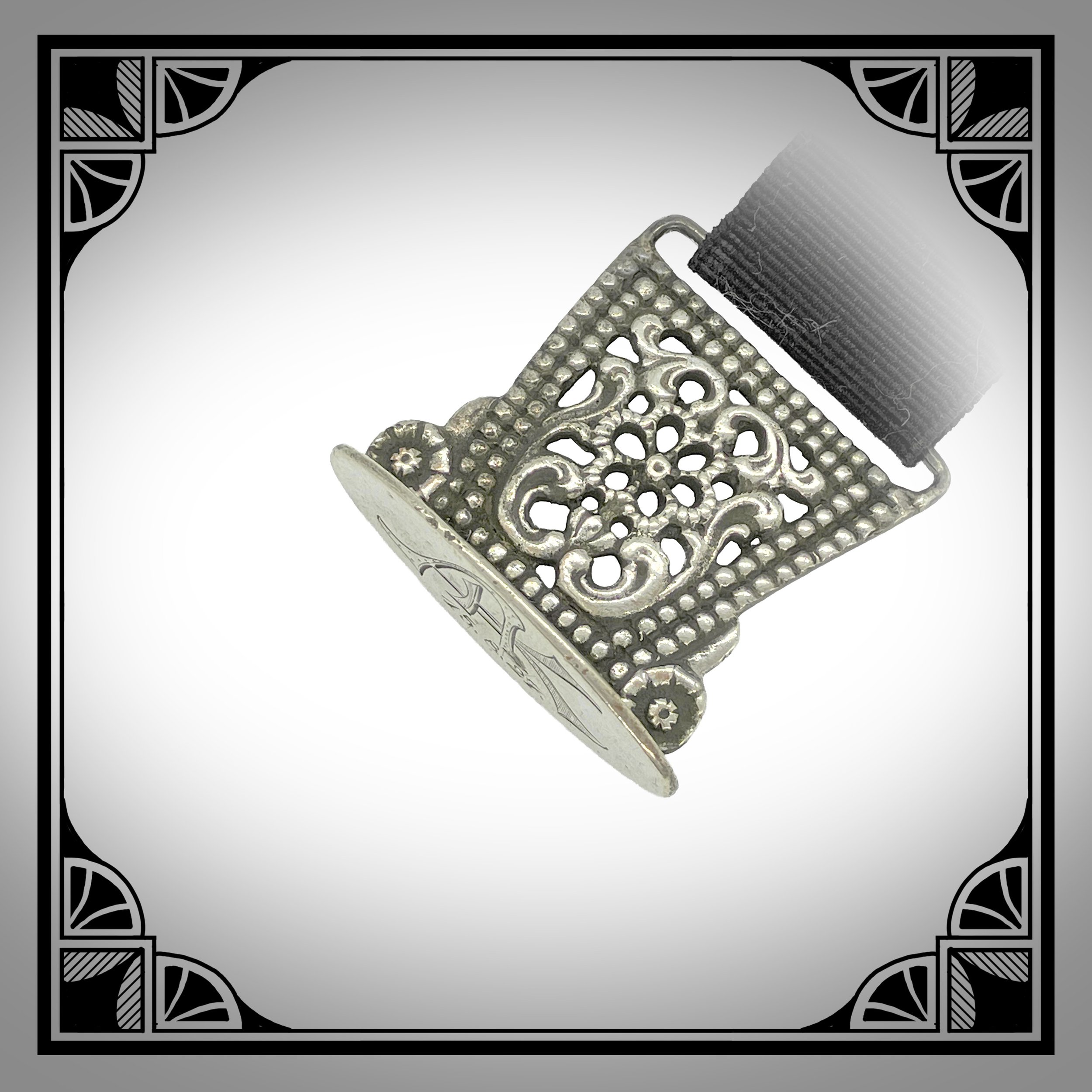 1920s Silver Openwork Ribbon Watch Fob 4.jpg