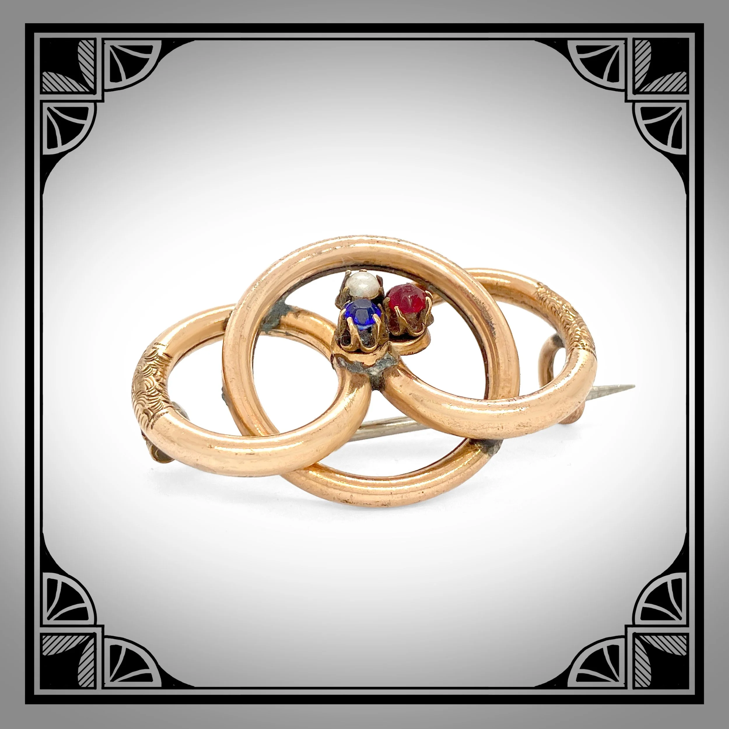 1890s Gold-Plated trinity Ring Brooch set with seed pearl and red & blue gemstones 2.jpg