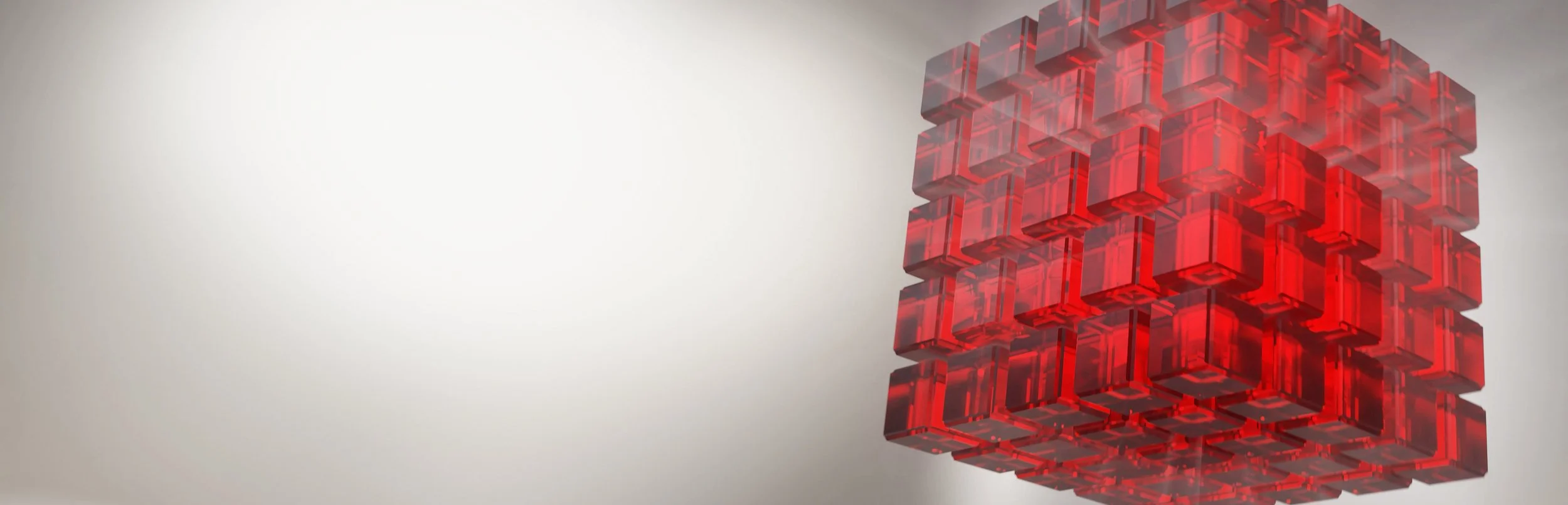 A 3D abstract cube structure made of red transparent smaller cubes, floating in space against a light background.