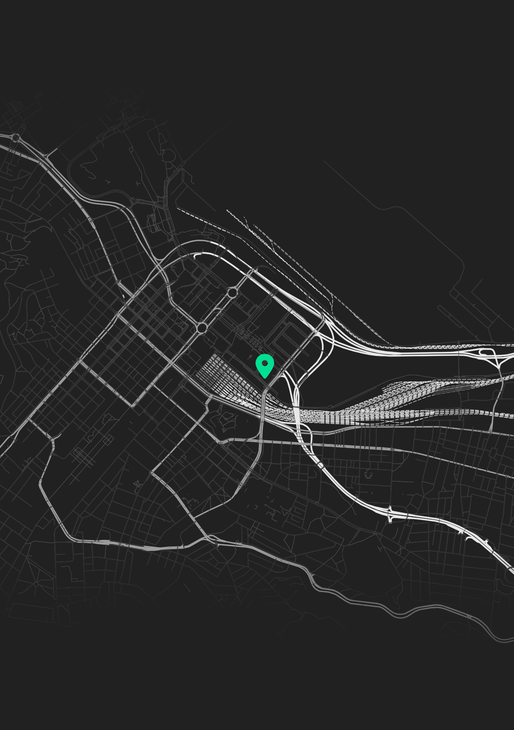 Black and white map with a location marker indicating a specific point in a city.