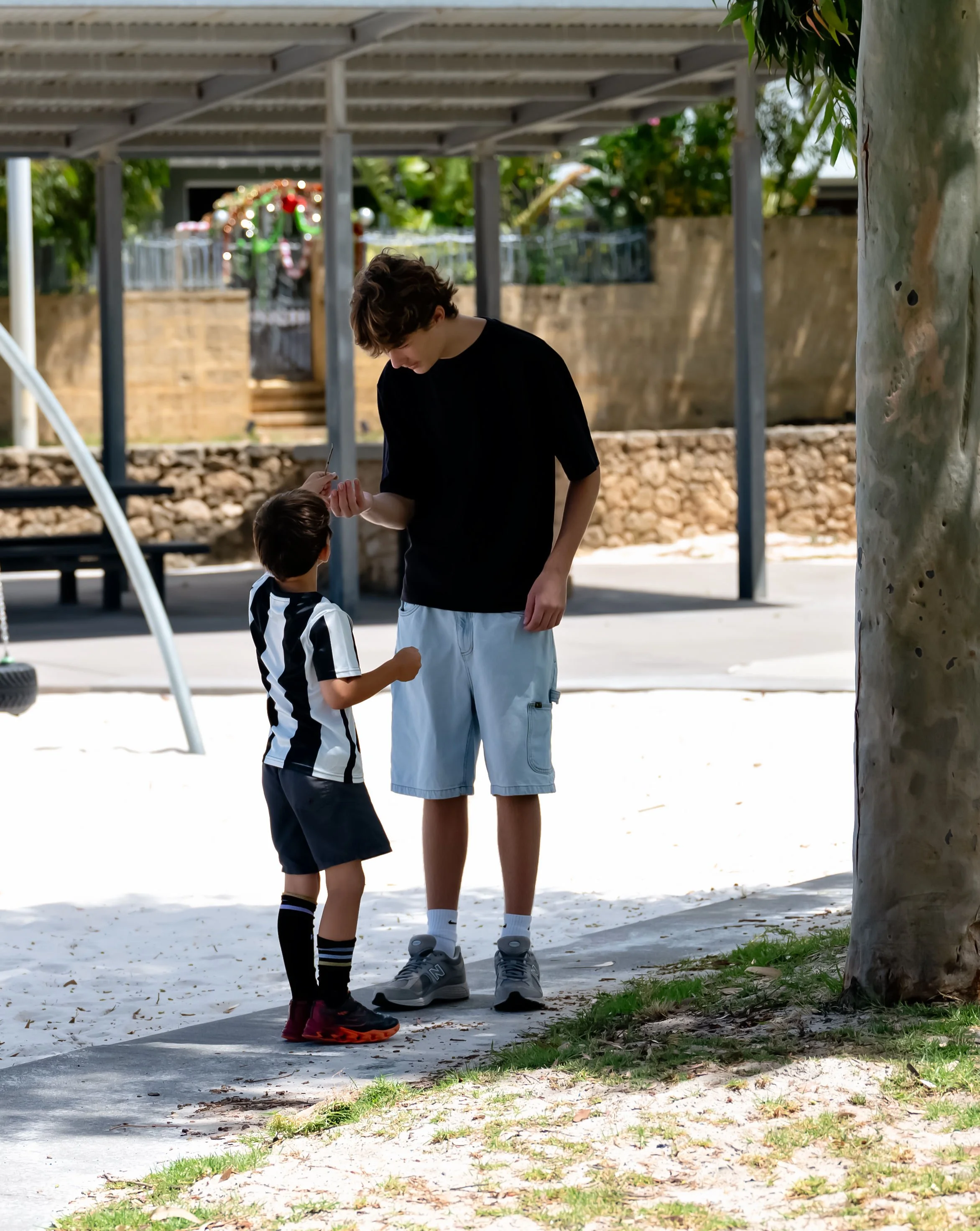 Adult Talking to child in park