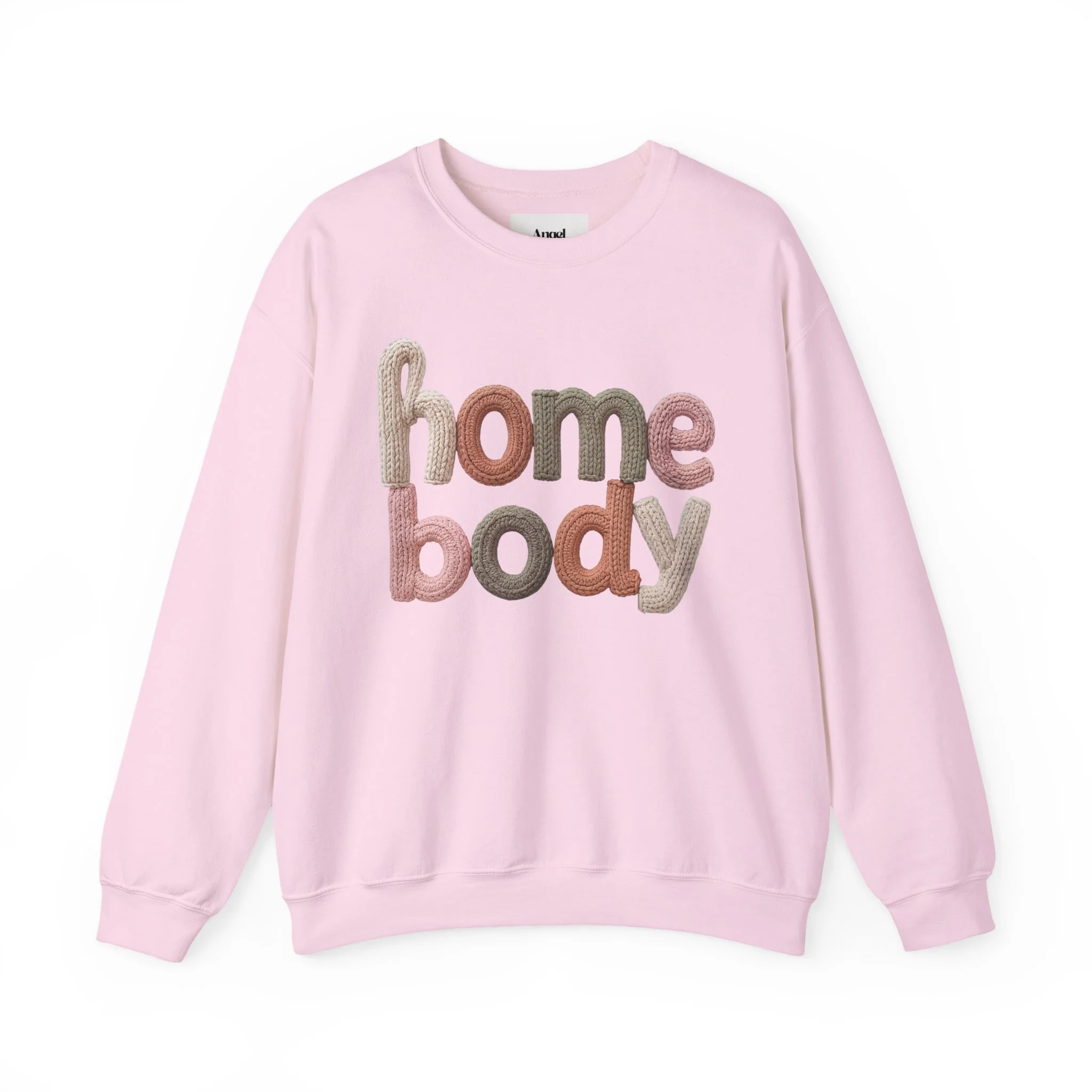 Pink sweatshirt with embroidered text 'home body' in multicolored yarn.