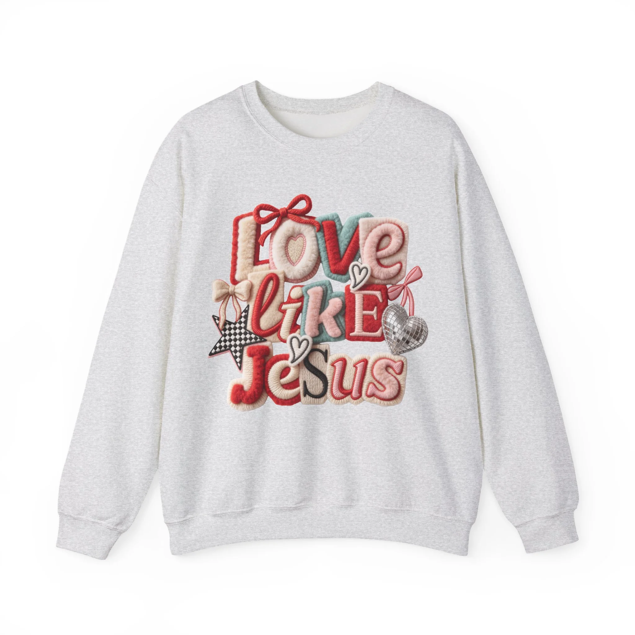 Gray sweatshirt with embroidered patches spelling 'Love Like Jesus' with hearts, stars, and bows in various colors and textures.