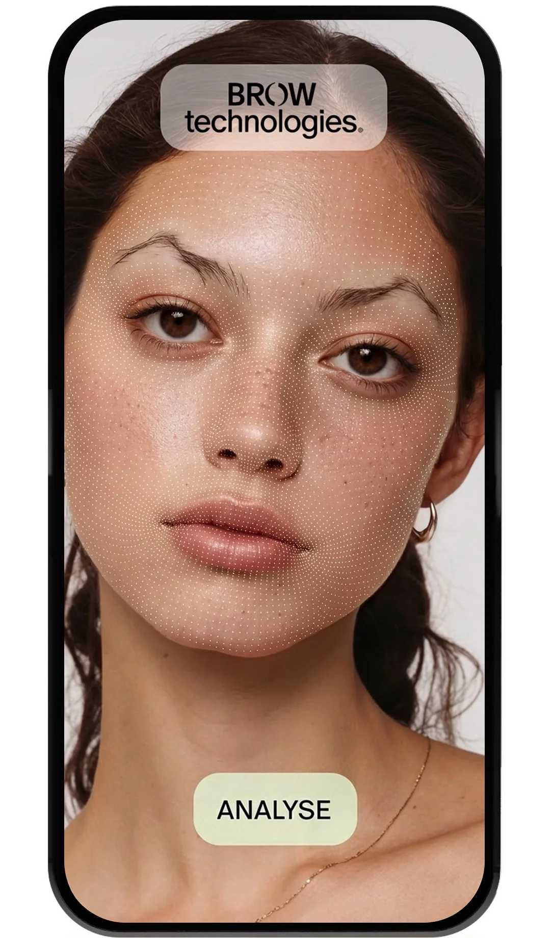 Close-up of a woman's face on a smartphone screen with dotted facial analysis overlay, showing the BROW technologies logo at the top and an 'ANALYSE' button at the bottom.