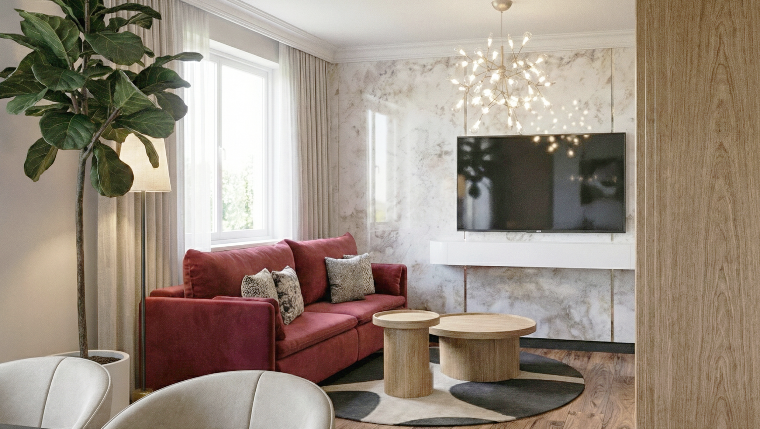 A cozy living room with a red sofa, gray and animal print throw pillows, wooden coffee tables, a large wall-mounted TV, a modern chandelier, a window with curtains, and a tall potted plant.