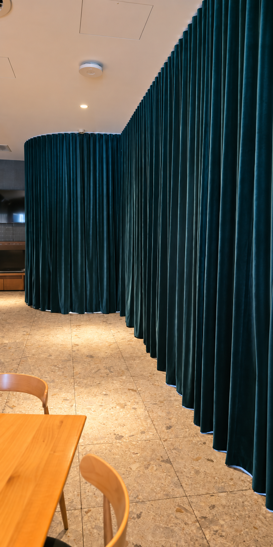 Floor-to-ceiling teal velvet S-Wave curtains installed by Glorious Home Decor, Perth