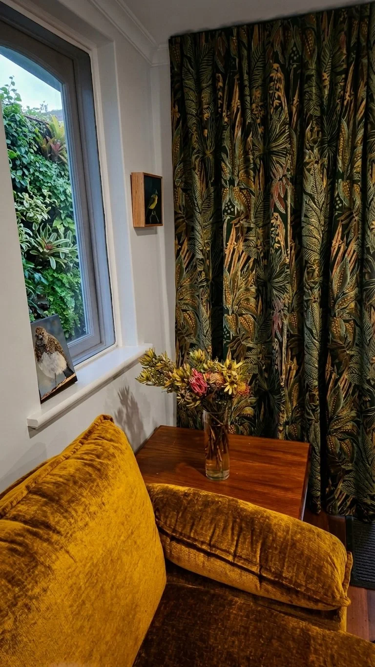 Botanical print pinch pleat curtains with gold velvet sofa cushions, made by Glorious Home Decor Perth