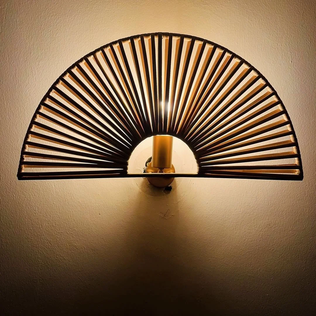 Fan Glow Wall Sconce
Inspired by traditional fan forms, this wall sconce spreads light gracefully, creating a soft halo effect with elegant lines.