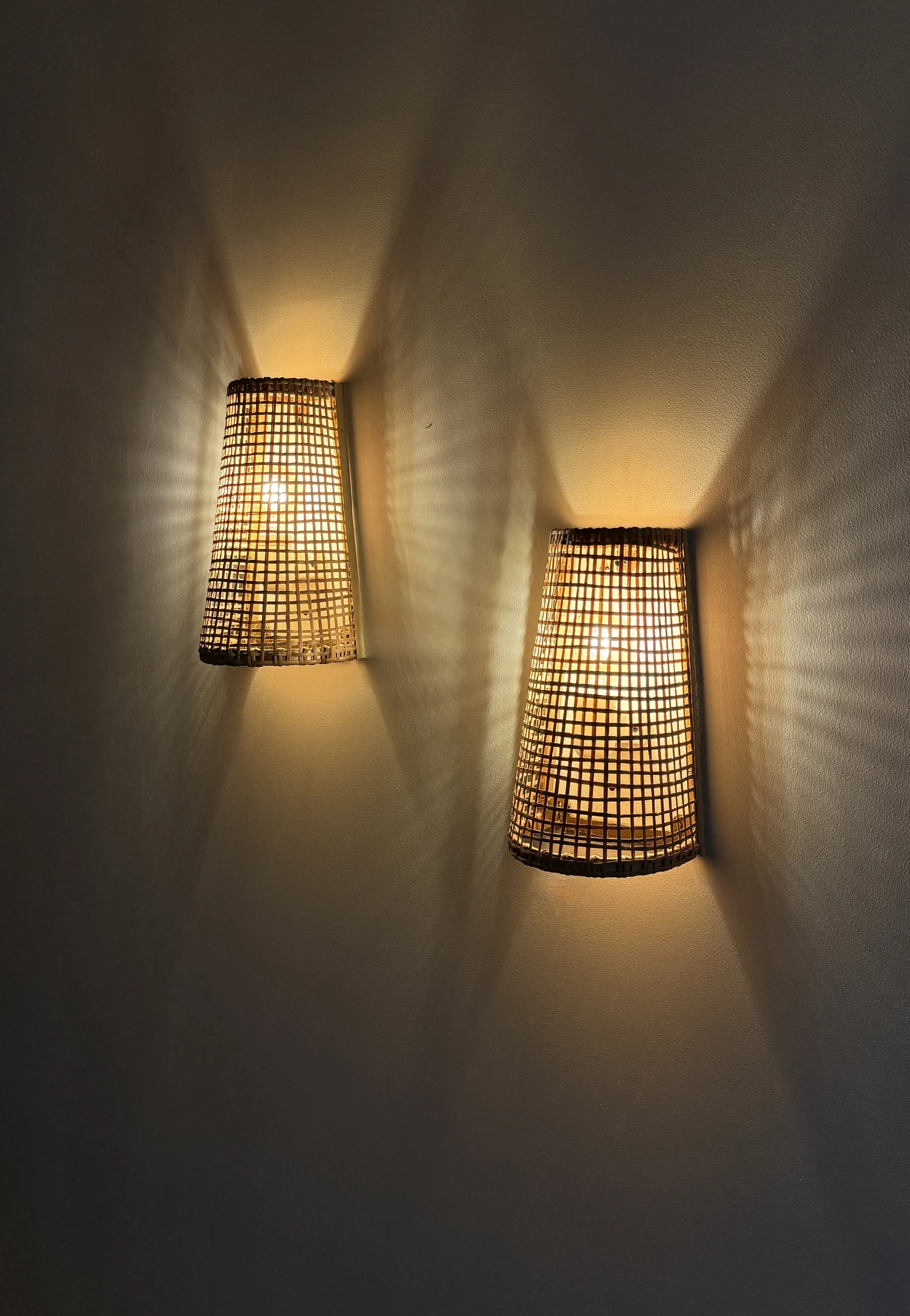 Rustic yet refined wall lights that add visual interest and ambient glow, ideal for hallways, bedrooms, or accent walls.
