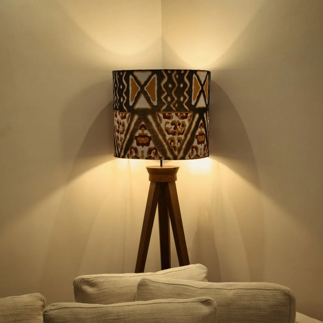 Featuring patterned craftsmanship and a warm glow, this wall lamp adds cultural richness and character to interior spaces.