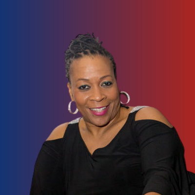 A woman with braided hair smiling, wearing a black top with cutout shoulders and hoop earrings, with a background that transitions from blue to red.