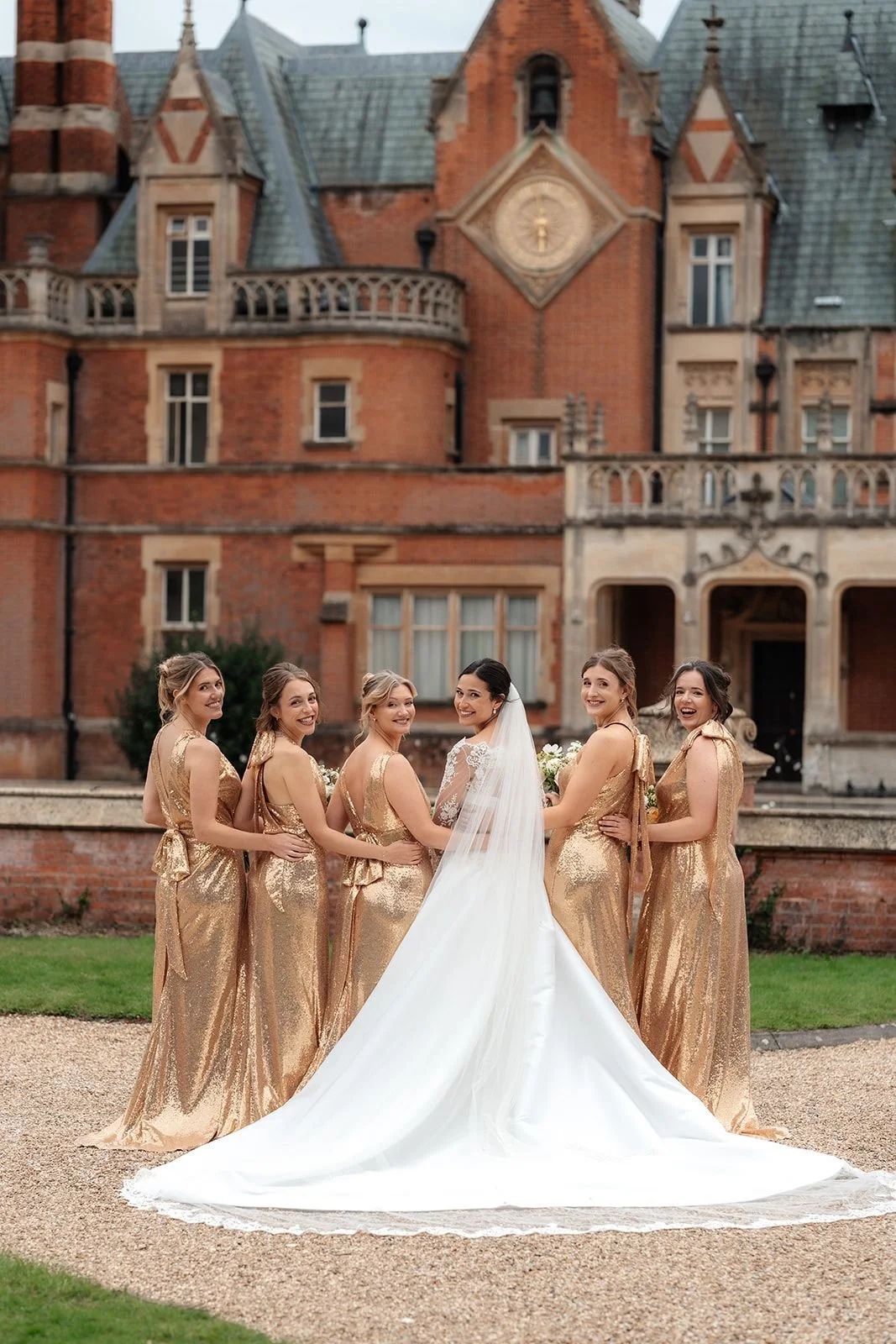 Couture mikado and lace wedding dress and gold bridesmaid dresses by Betrice Espinosa