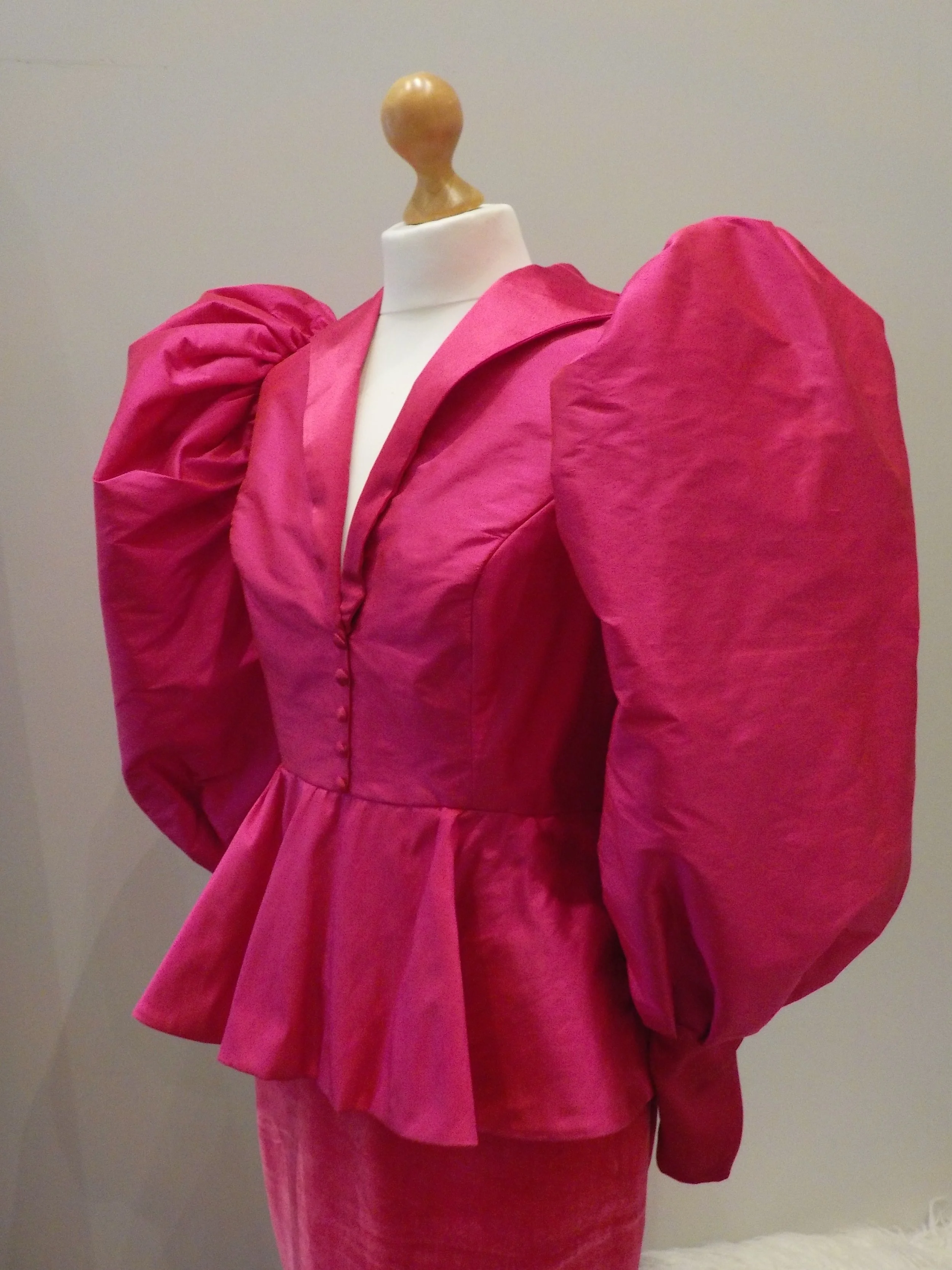 Bright pink silk peplum dress by Beatrice Espinosa