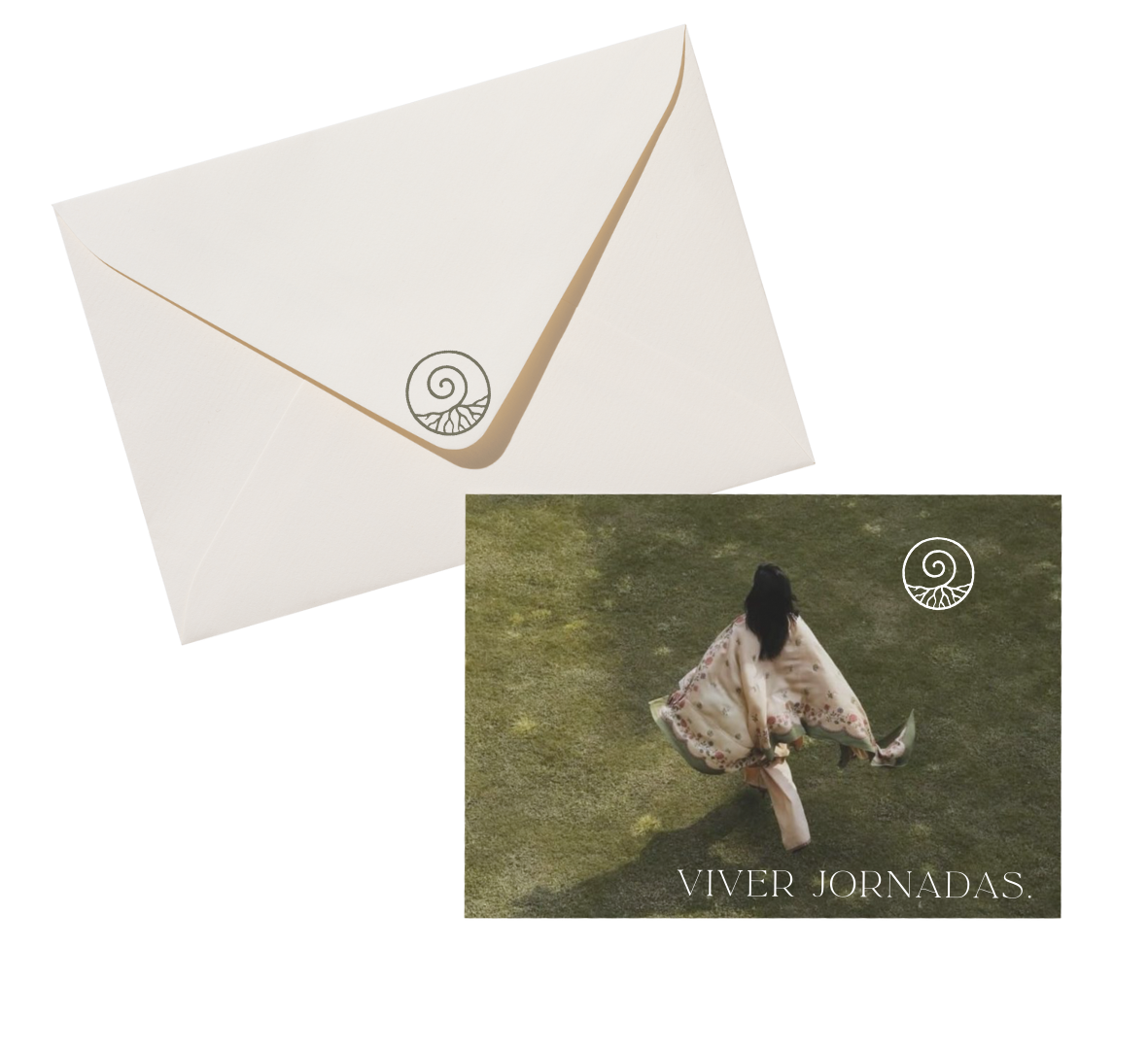 A white envelope and a card showing a woman in a floral dress twirling on grass with the text "VIVER JORNADAS."