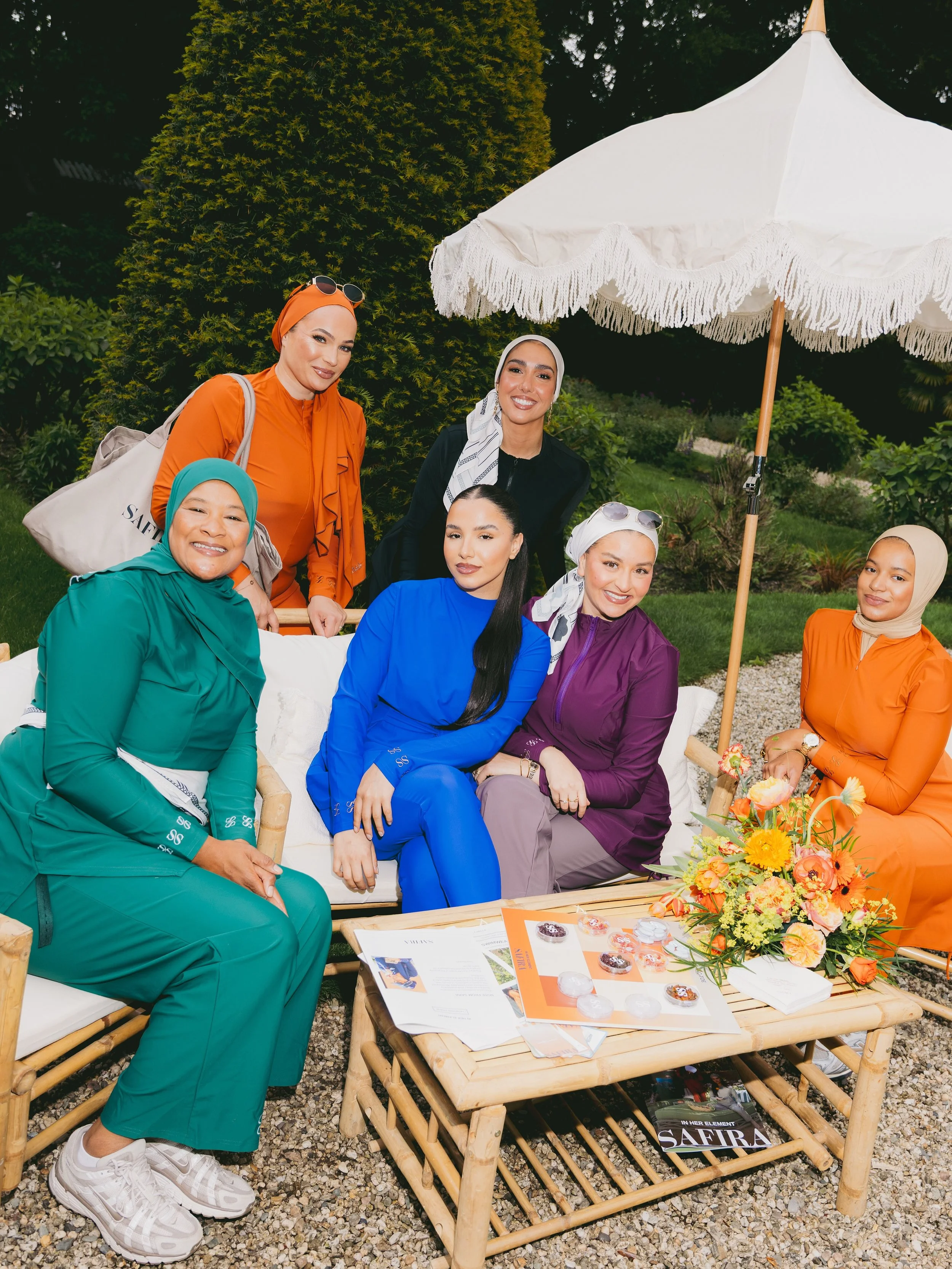 What started with rain during setup turned into the most beautiful sunny afternoon, just in time for the launch of Safira&rsquo;s new &lsquo;The Element Burkini Collection&rsquo;.
Guests were welcomed into the garden by a live harpist, enjoyed person