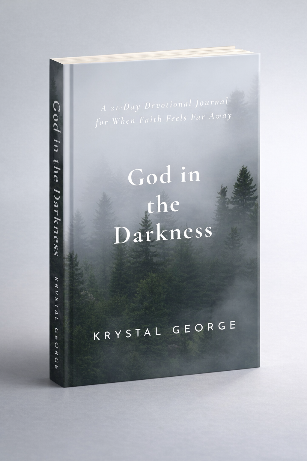 Book titled 'God in the Darkness' by Krystal George, set against a foggy forest background with evergreen trees
