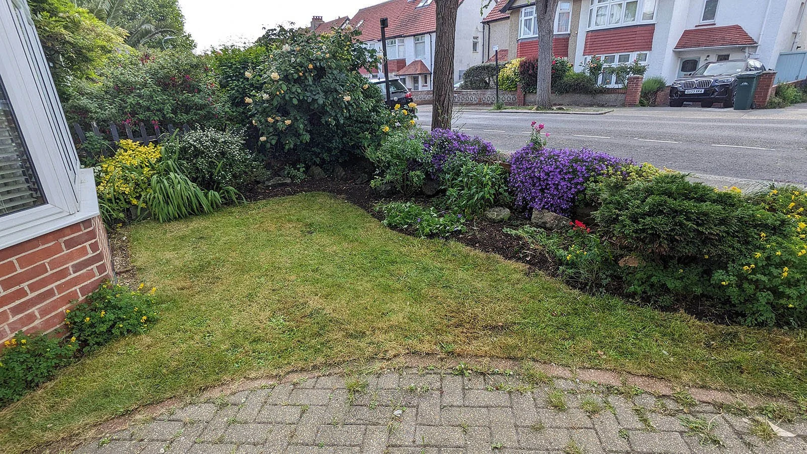 Weeded, cut back borders and mown lawn