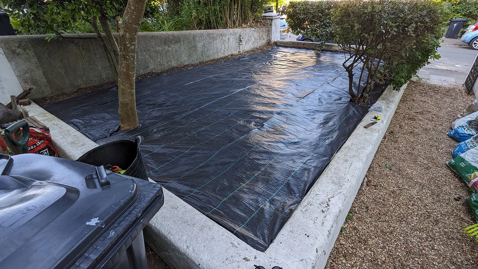 Gravel garden in progress showing membrane