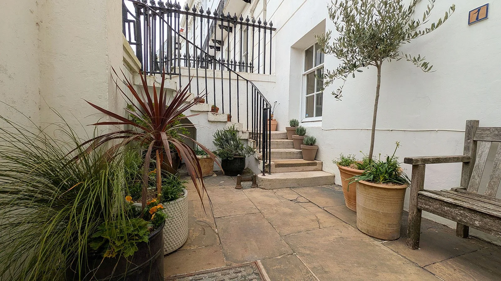 Beautiful coastal courtyard garden in pots
