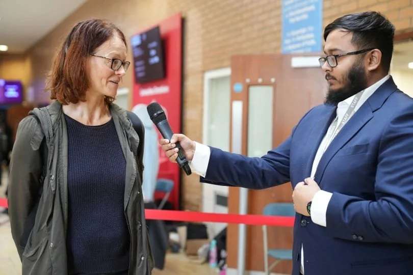 Head of Youth interviewing Scientist.jpg