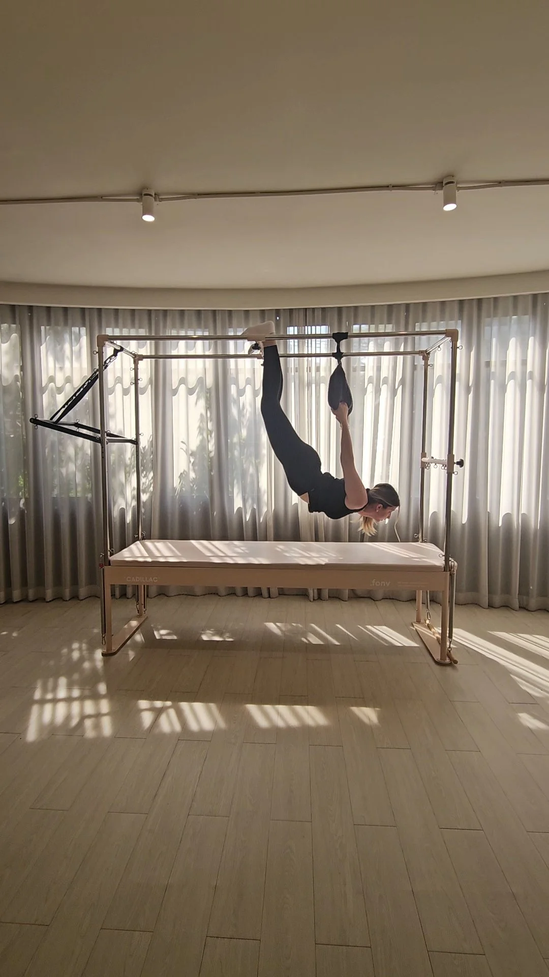 hanging on the cadillac pilates