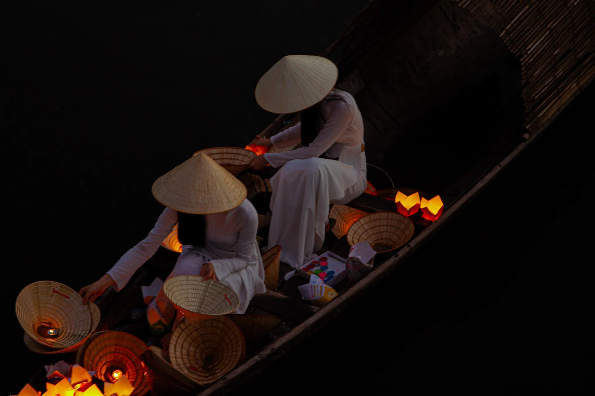 Floating lanterns on the Nhu Y River — a quiet moment of light, wishes, and reflection.