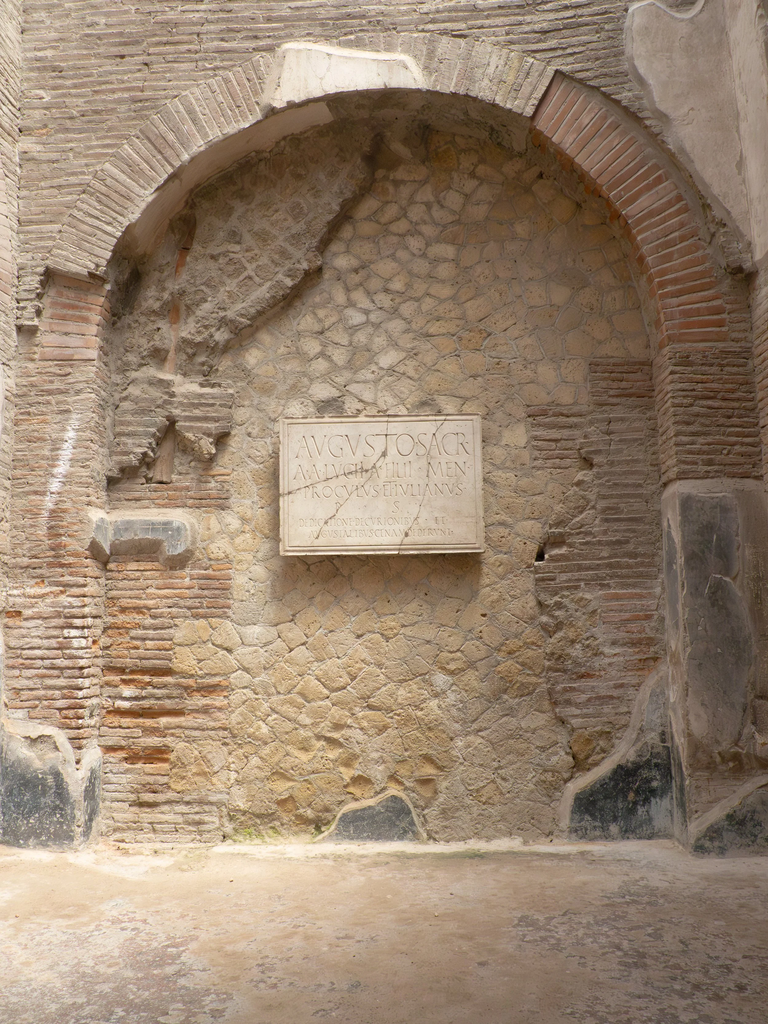 Ancient Roman Inscription in the Ruins of Herculaneum.jpg
