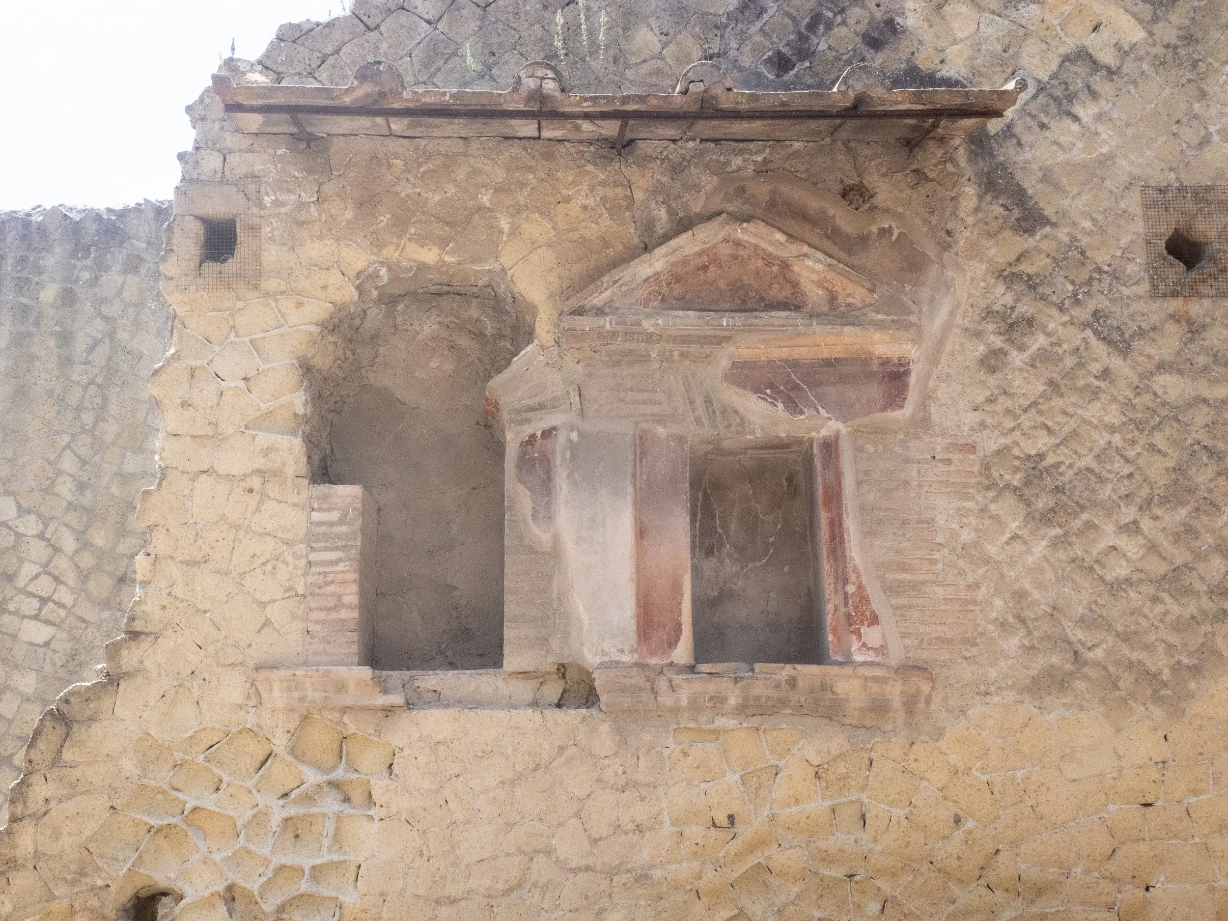 Ancient Roman Wall and Fresco Remains in Herculaneum Ruins.jpg