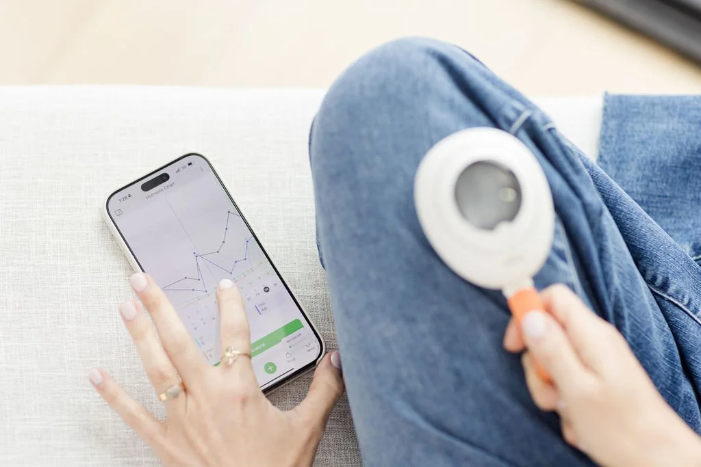 hand-using-mira-device-for-hormone-balancing-in-women