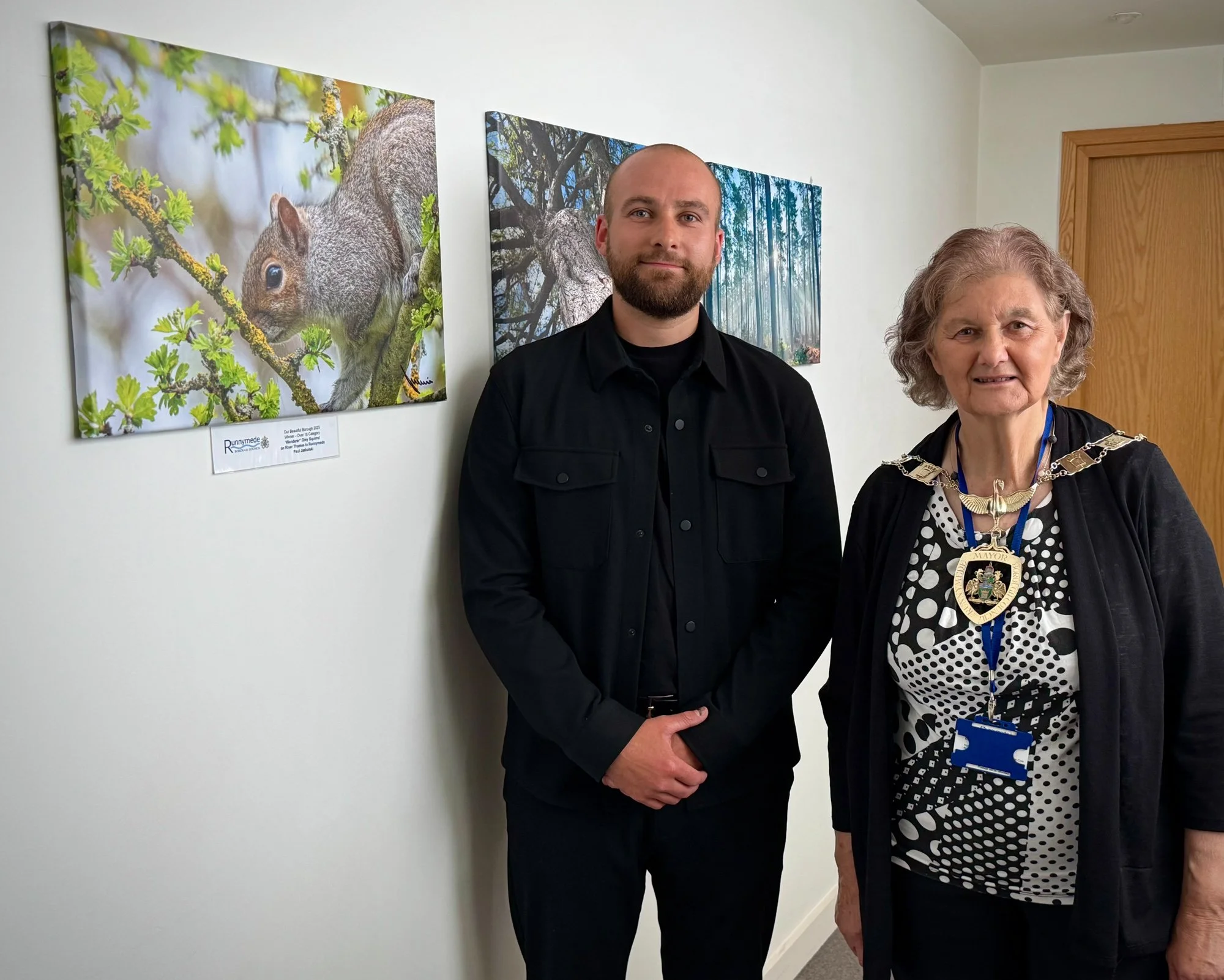 Paul Jaskulski, pictured alongside Mayor, winner of Runnymede photography competition 2025 awarded image displayed on canvas