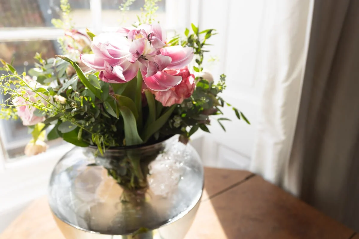 flowers in the sunlight on windowsill