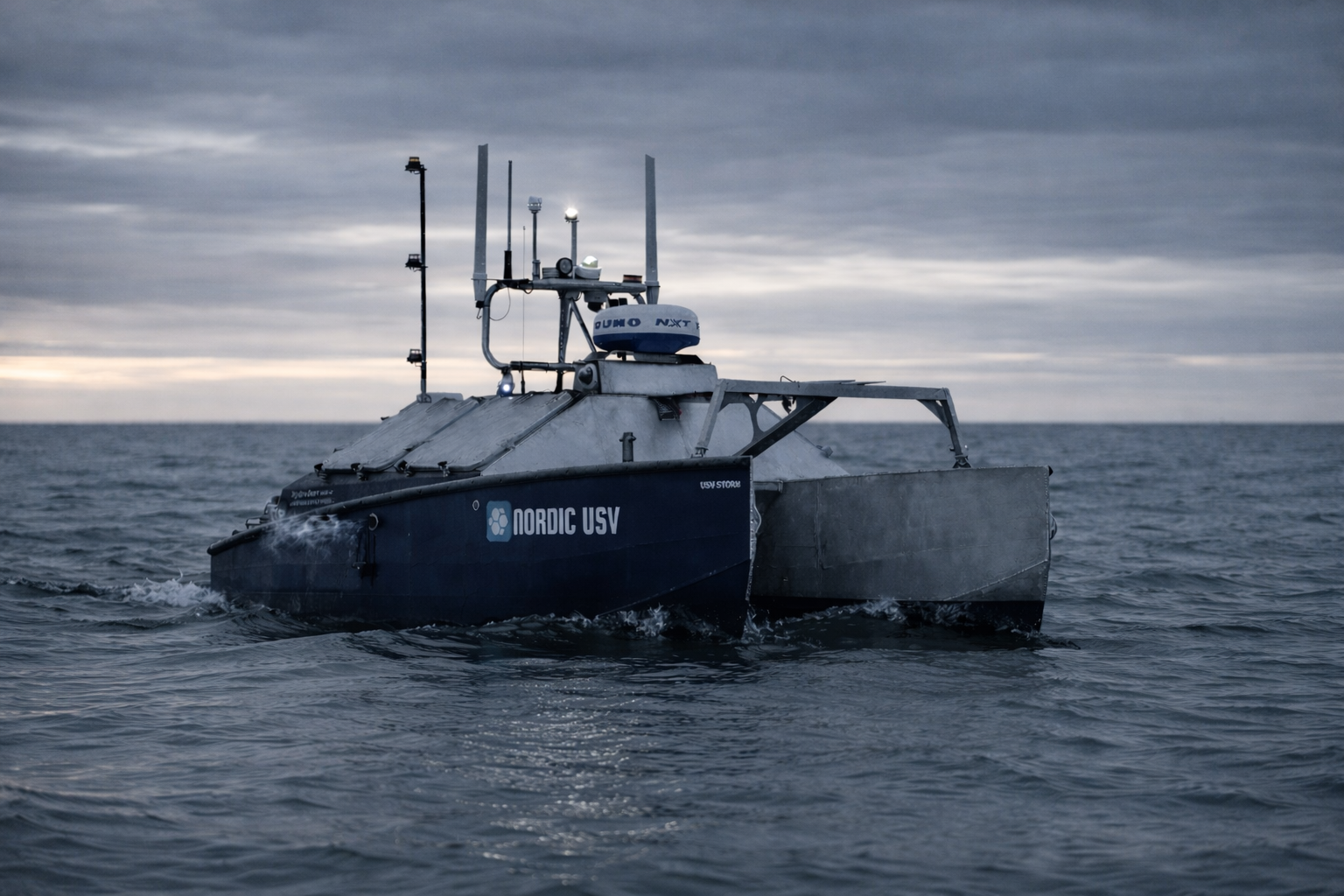 A robotic boat labeled 'Nordic USV' navigating on the ocean under a cloudy sky.