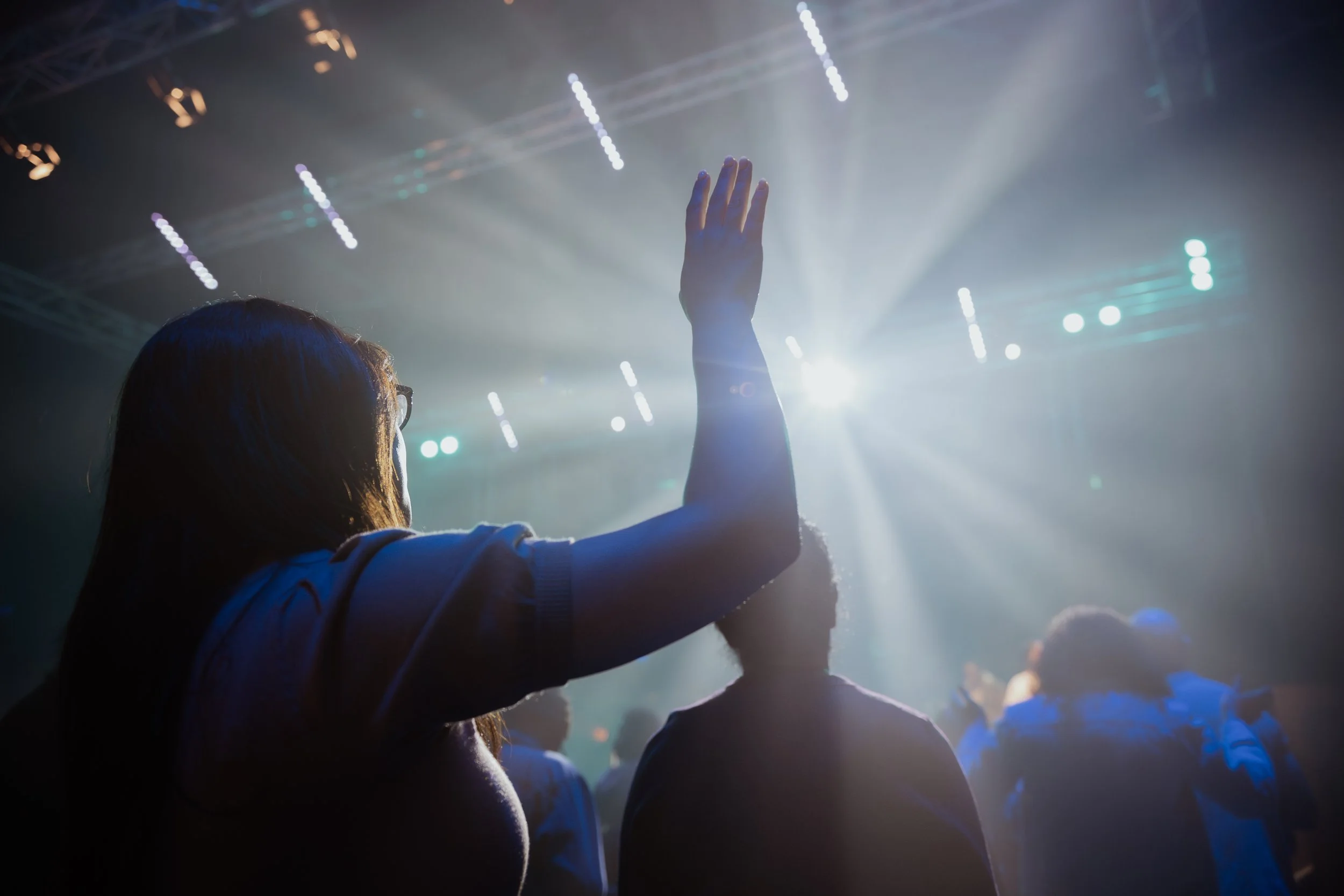 Arm lifted in worship