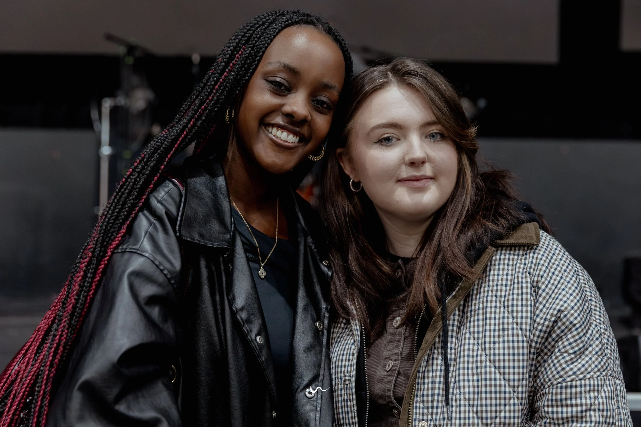 Two friends smiling for the picture