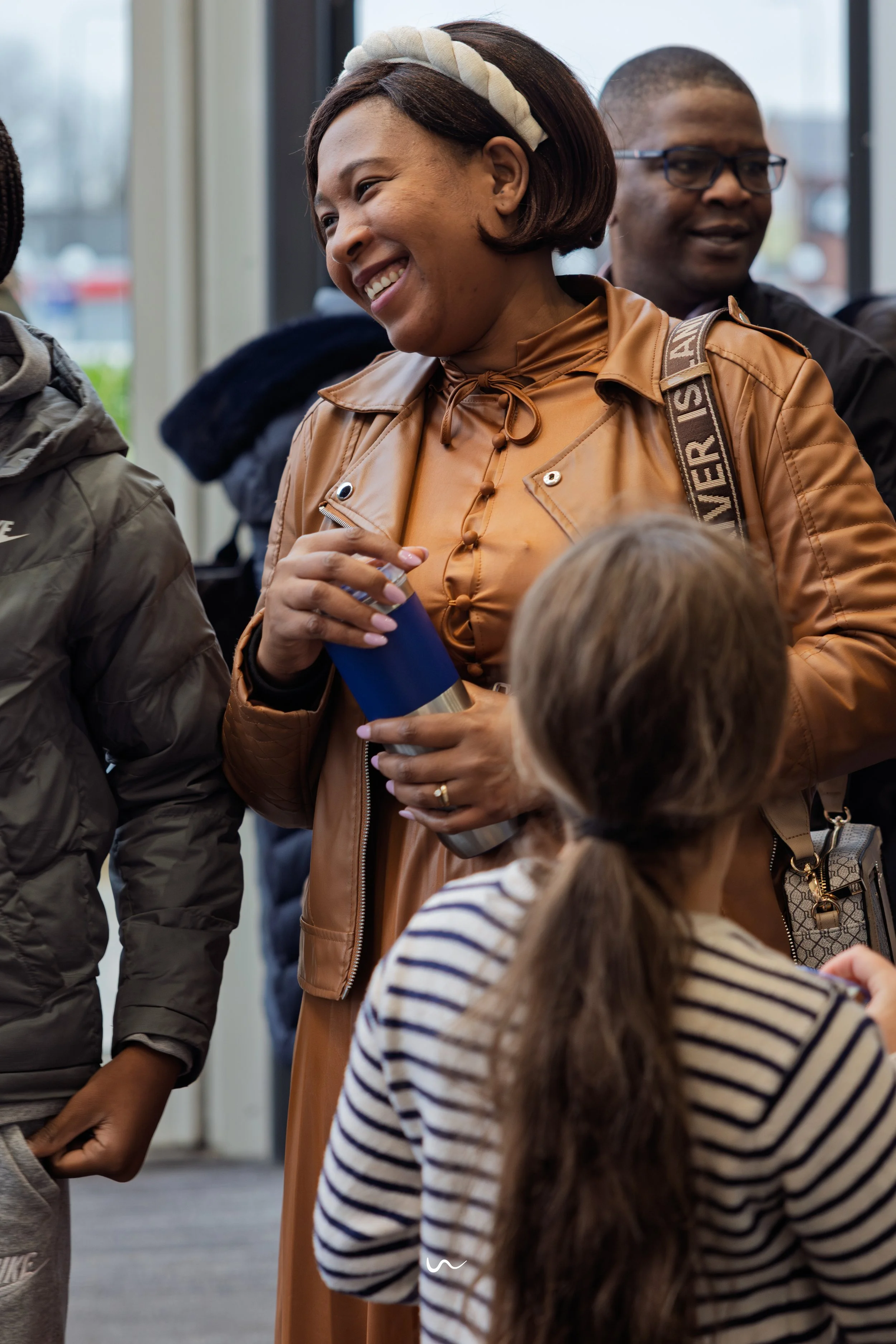 Lady smiling off camera