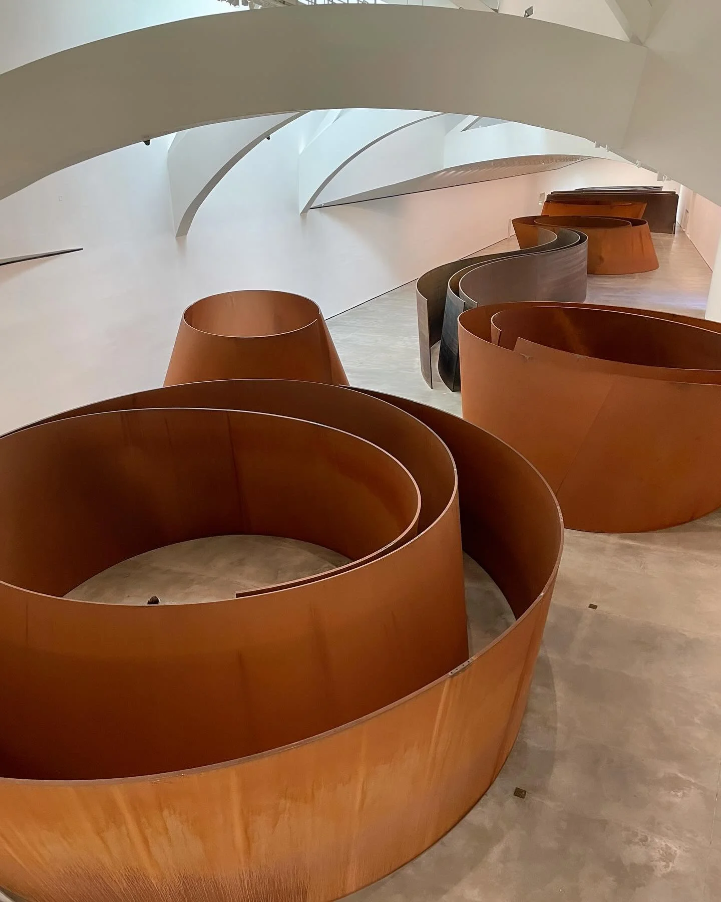 RIP Richard Serra. Known for his large-scale, site-specific sculptures, he truly was a &ldquo;poet of iron.&rdquo; Viewing this instillation @museoguggenheim was a life goal and I&rsquo;m glad I got to see it back in 2021. Your monumental presence wi