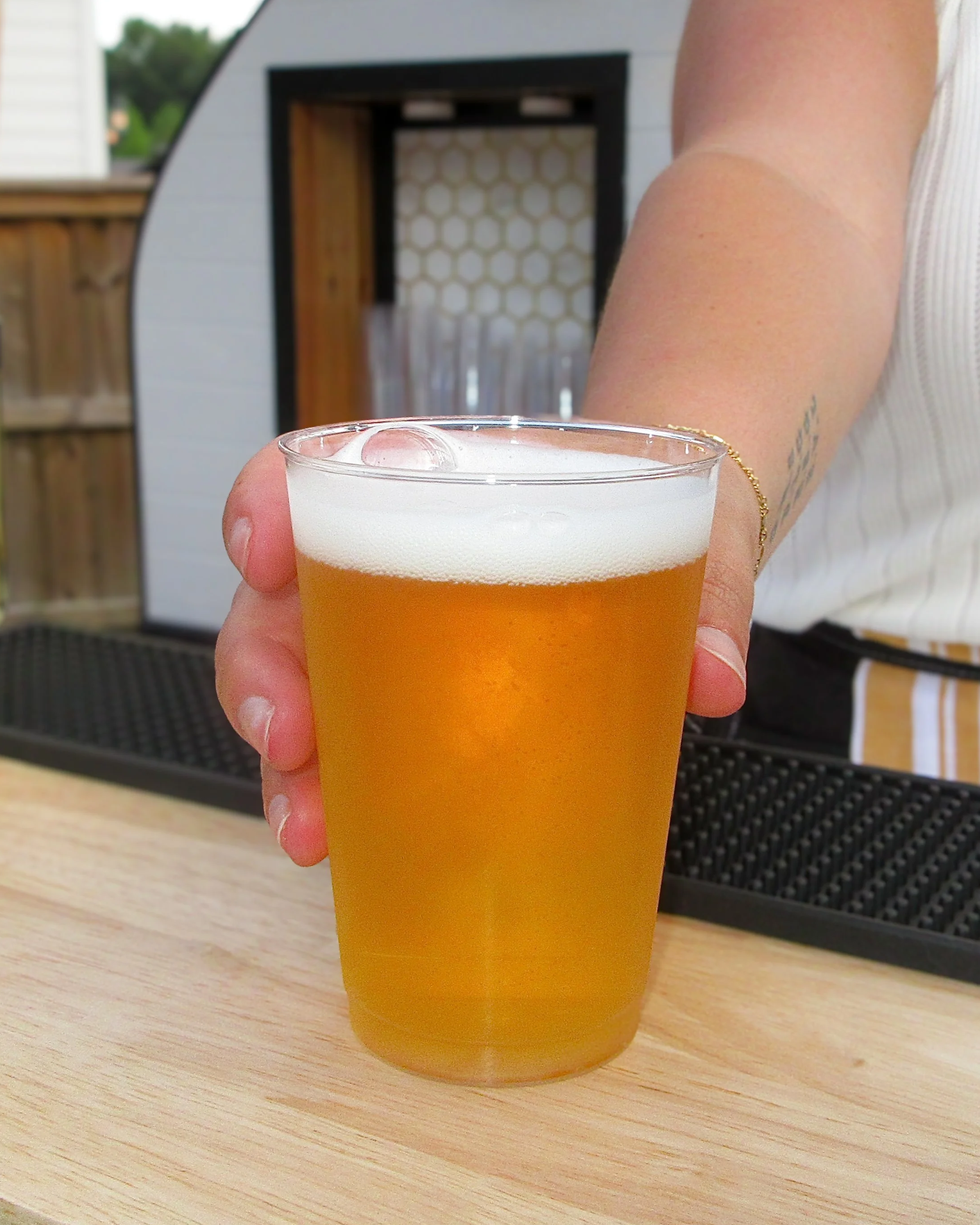 BeesWings Mobile Drinkery Perfect chilled pour of beer being served