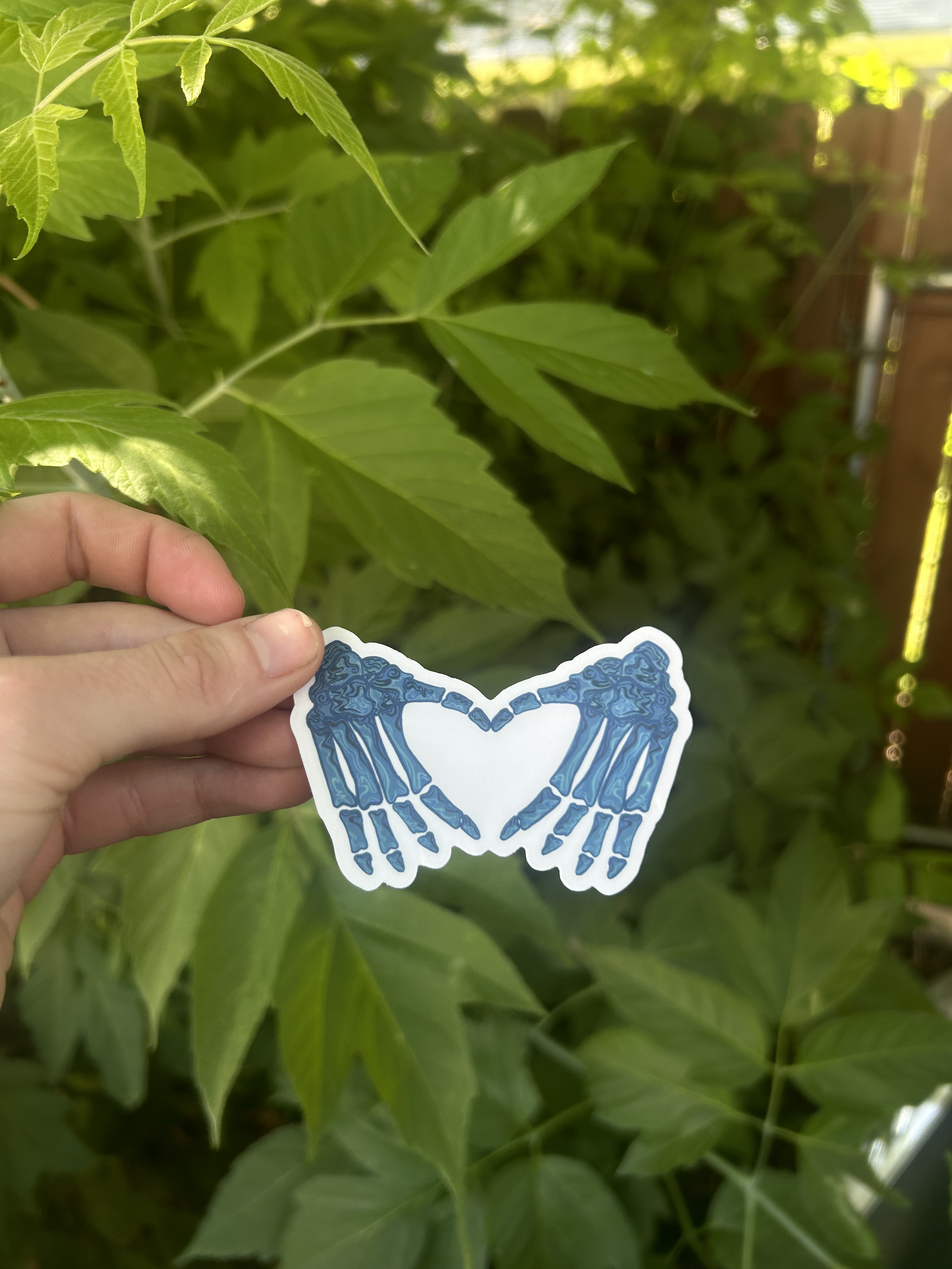 Trippy Skeleton Hand Heart Sticker