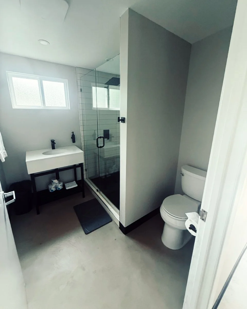 The bathroom in a Lakeside Cabin at Camp Coffee Shop. Lakeside Cabins are the only accommodation option with private baths.