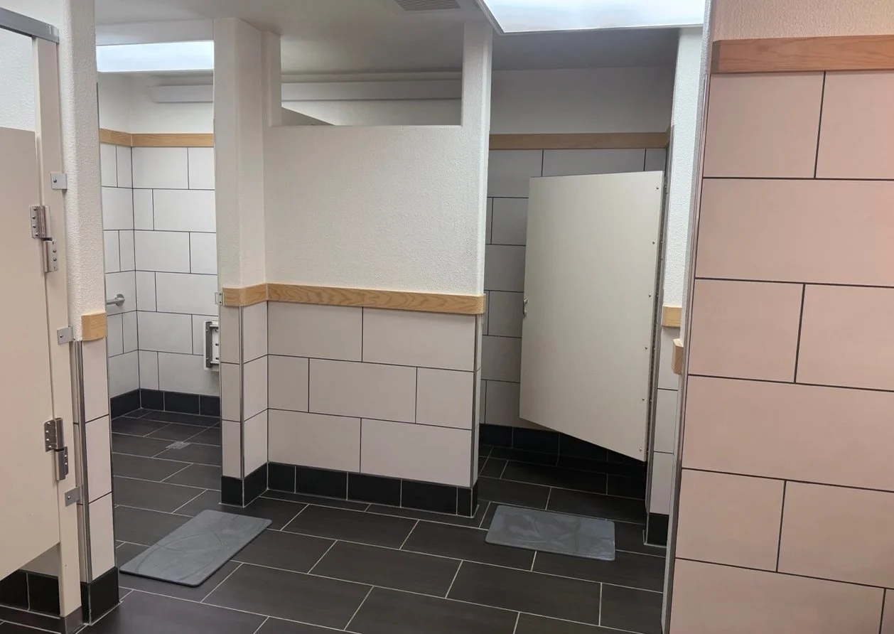 Some of the showers in Lodge at Enchanted Hills. The rooms in the Lodge share showers and bathrooms.