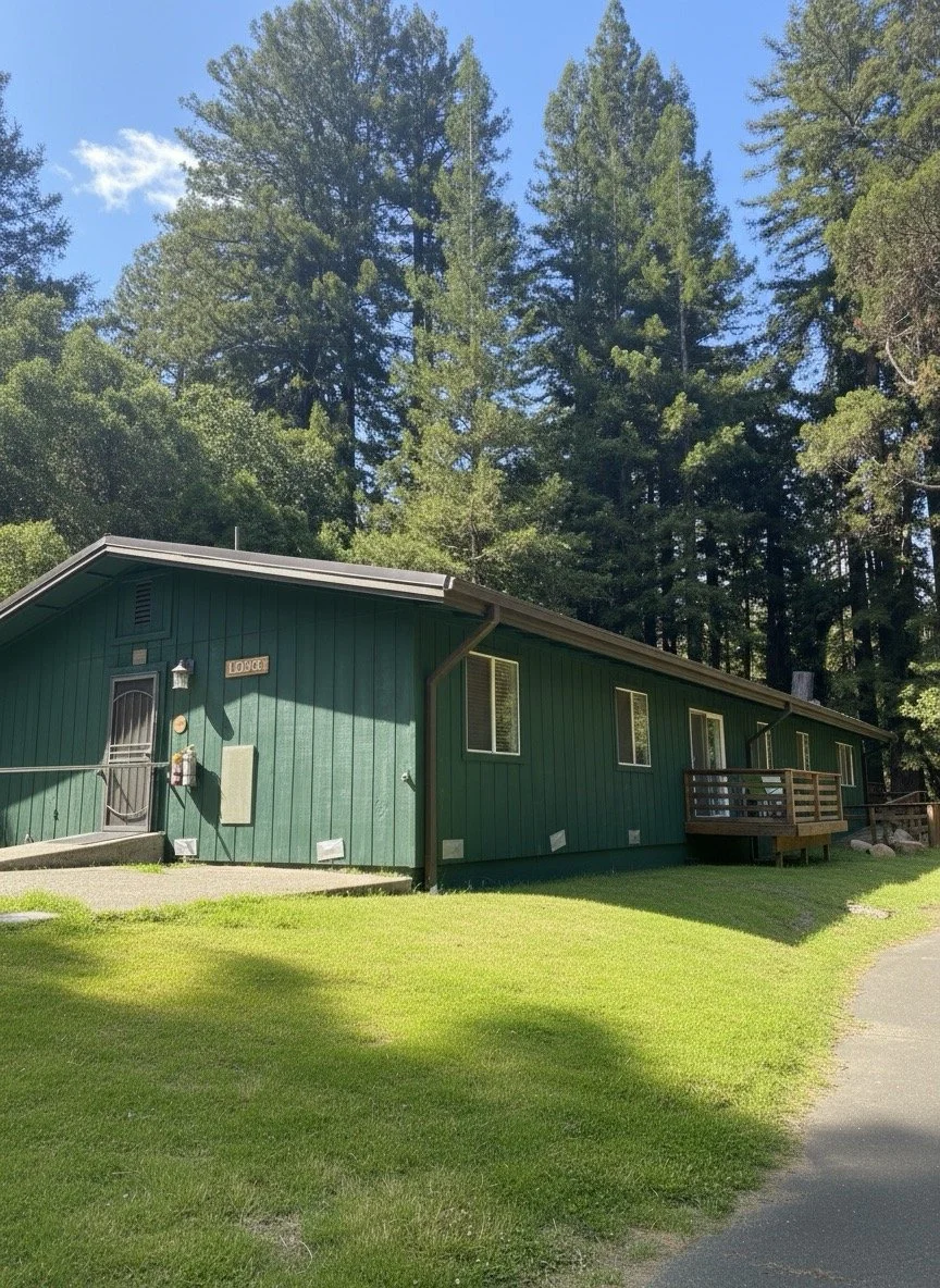 The Lodge at Enchanted Hills. One of the buildings that survived the wildfire, the Lodge has several shared rooms, some with balconies, available for Camp Coffee Shop Attendees.
