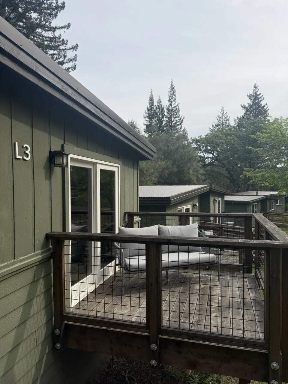 The Lakeside Cabins at Camp Coffee Shop feature a bedroom, sitting room, and private bath. Most have balconies as well.