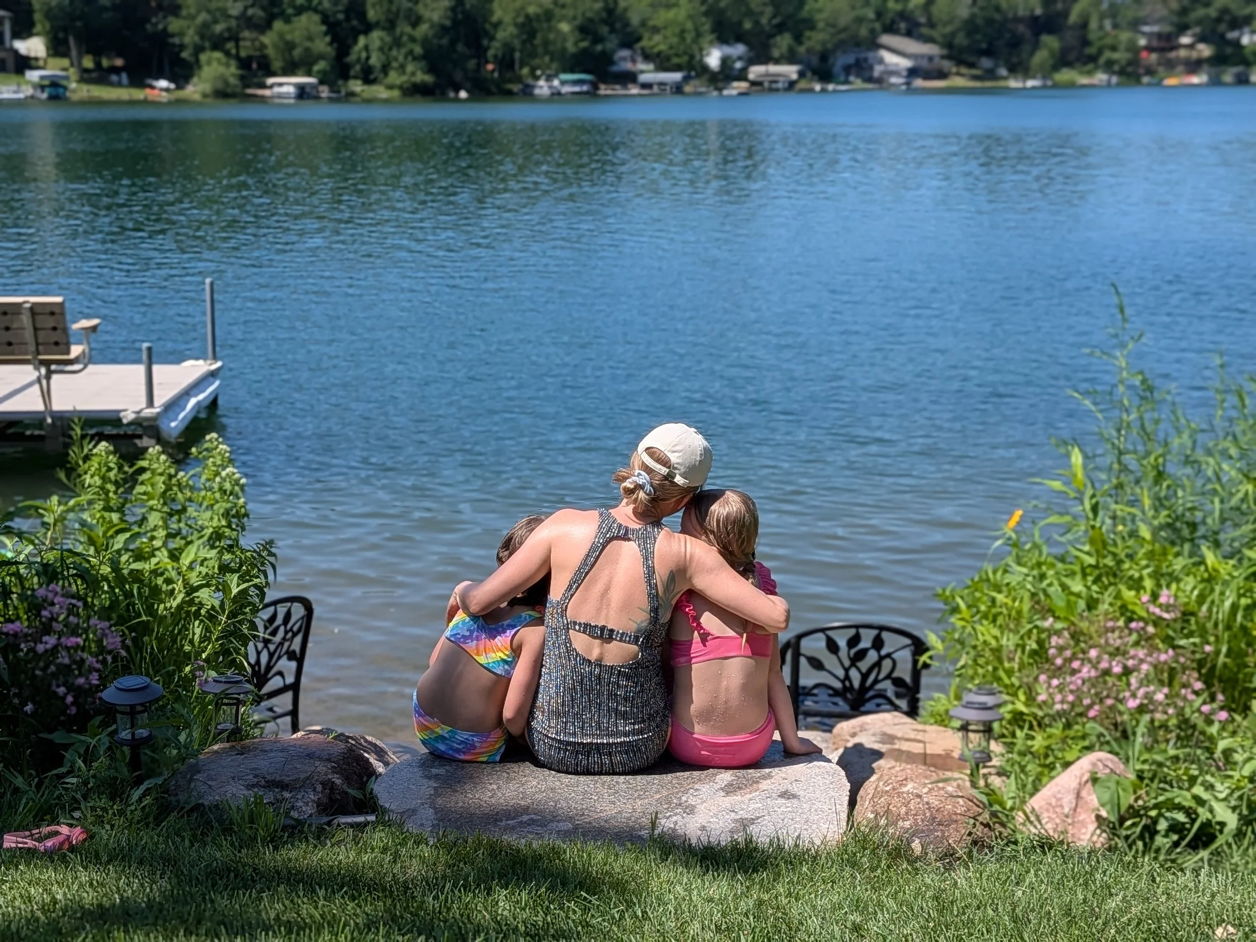 Sam, a Colorado therapist, with her two children outdoors